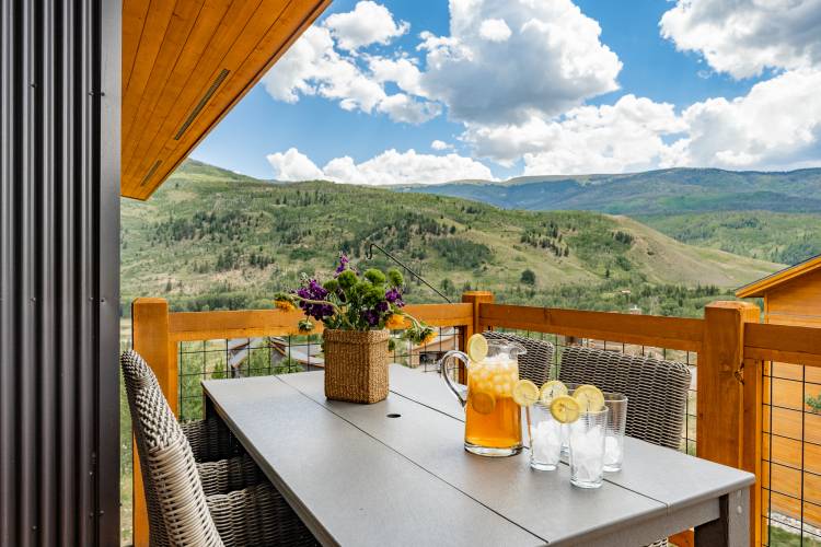 Flowers on a table outside at our Solstice Property 