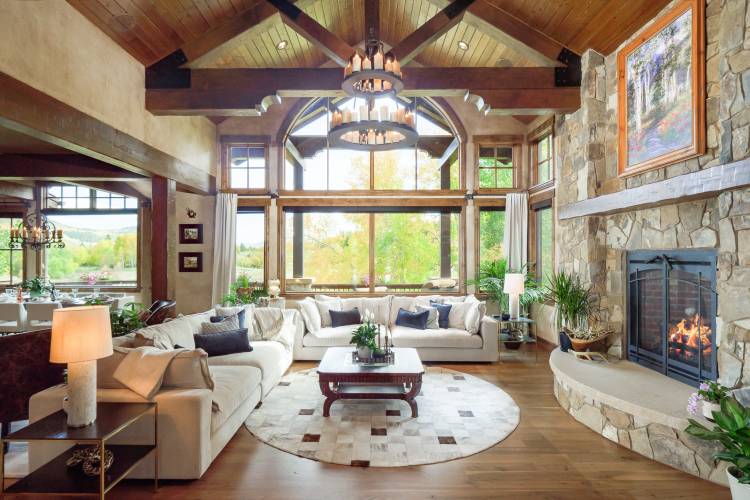 A living room with a fireplace in Silverthorne Colorado