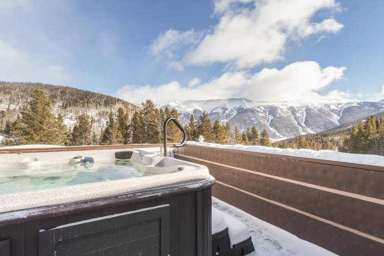 A Picture of a hot tube with mountain views in Copper Mountain